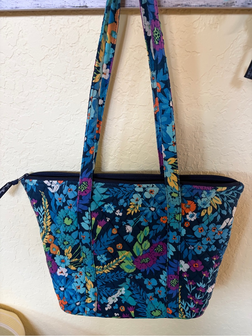 Vera Bradley Tote in bright colors and background navy blue